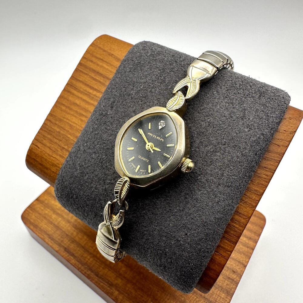 Milan Vintage Women's Quartz Watch Black Dial Faded Gold Tone Leaf Bracelet